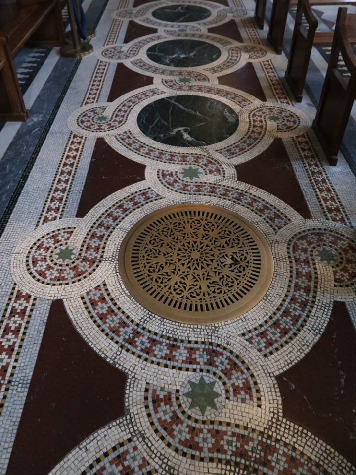 Marble floors designed in geometric patterns.