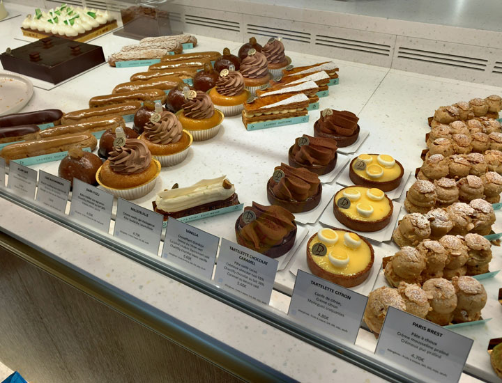 Eclairs and Paris-Brests are also on display.