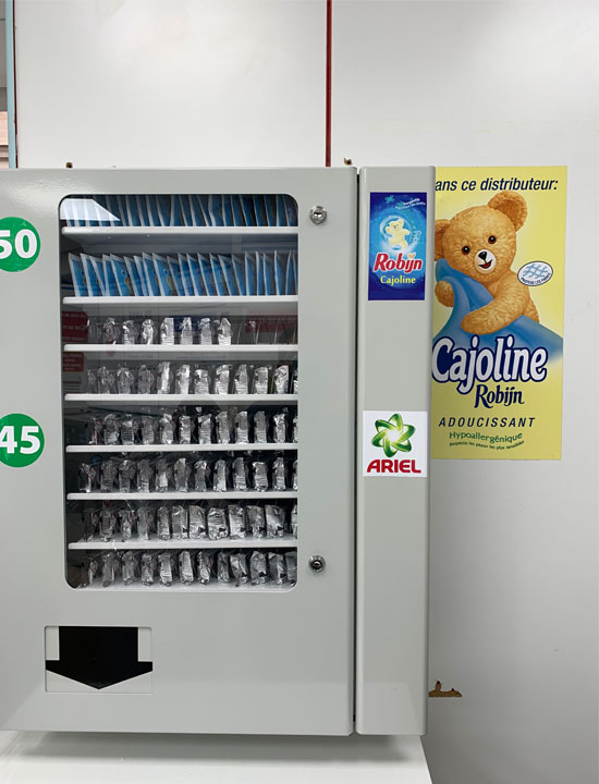 Detergent and fabric softener vending machines.