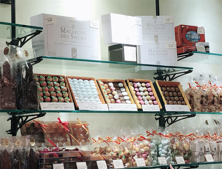 These macarons are displayed at the far end of the sales floor.